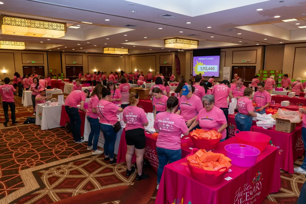 A group of volunteers packing hygiene kits at PeriodPalooza